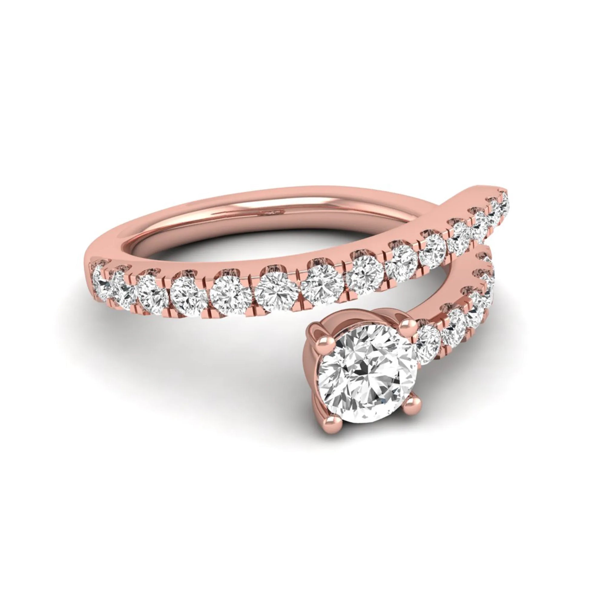 Round cut lab grown diamond bypass engagement ring with round pavé accent diamonds in a four-prong setting in rose gold