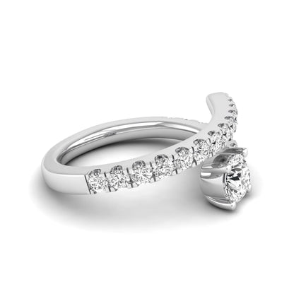 Round cut lab grown diamond bypass engagement ring with round pavé accent diamonds in a four-prong setting in white gold