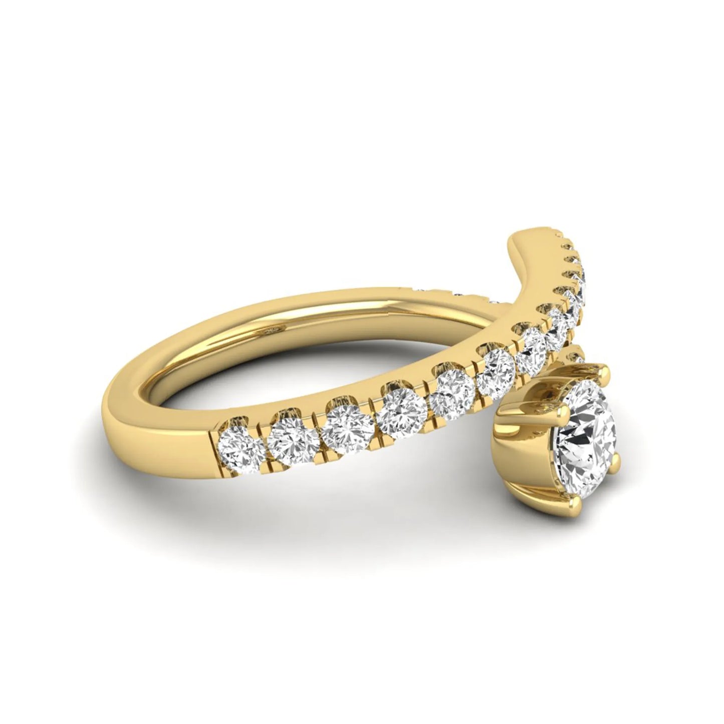Round cut lab grown diamond bypass engagement ring with round pavé accent diamonds in a four-prong setting in yellow gold