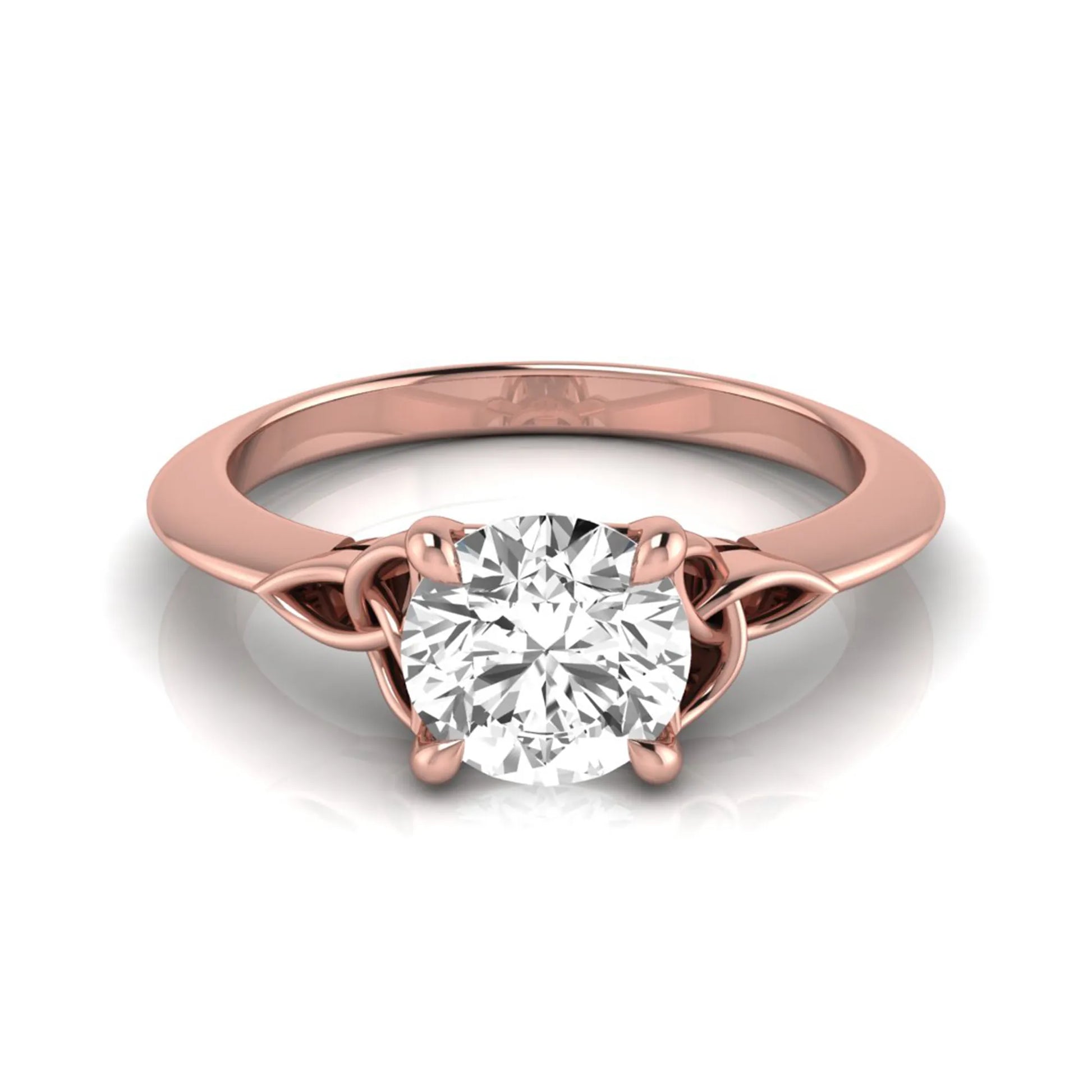 Round cut IGI certified lab grown diamond solitaire engagement ring featuring an elegant Celtic knot inspired gallery in a polished rose gold setting.