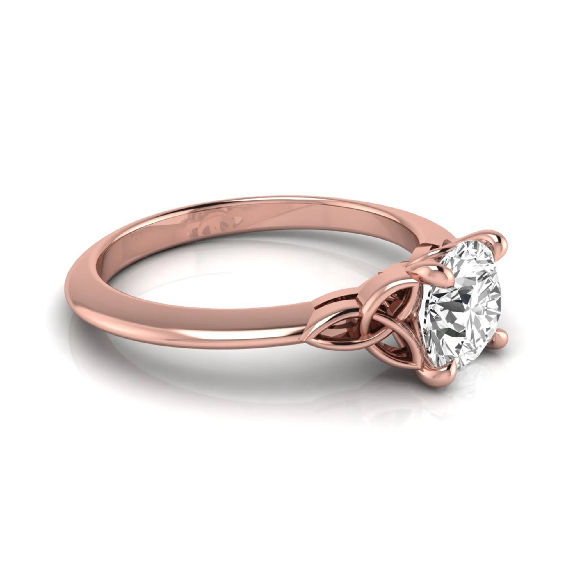 Round cut IGI certified lab grown diamond solitaire engagement ring featuring an elegant Celtic knot inspired gallery in a polished rose gold setting.