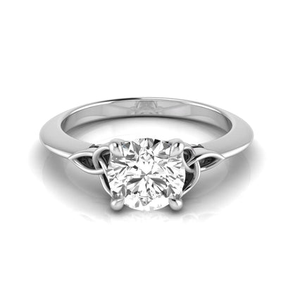 Round cut IGI certified lab grown diamond solitaire engagement ring featuring an elegant Celtic knot inspired gallery in a polished white gold setting.