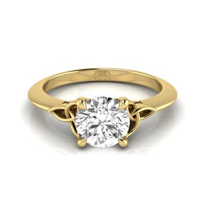 Round cut IGI certified lab grown diamond solitaire engagement ring featuring an elegant Celtic knot inspired gallery in a polished yellow gold setting.