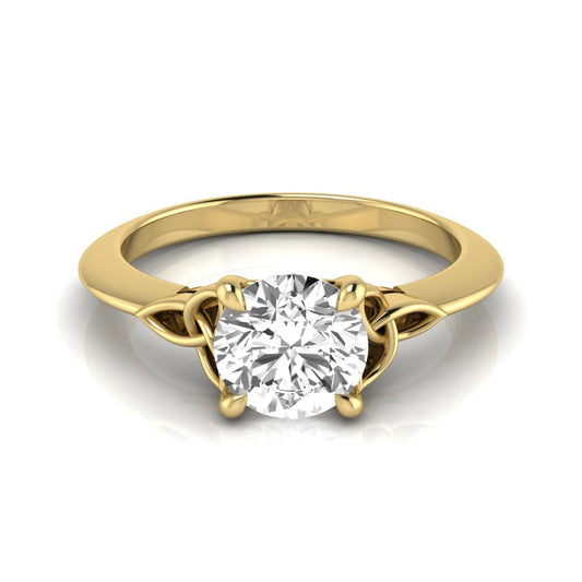 Round cut IGI certified lab grown diamond solitaire engagement ring featuring an elegant Celtic knot inspired gallery in a polished yellow gold setting.