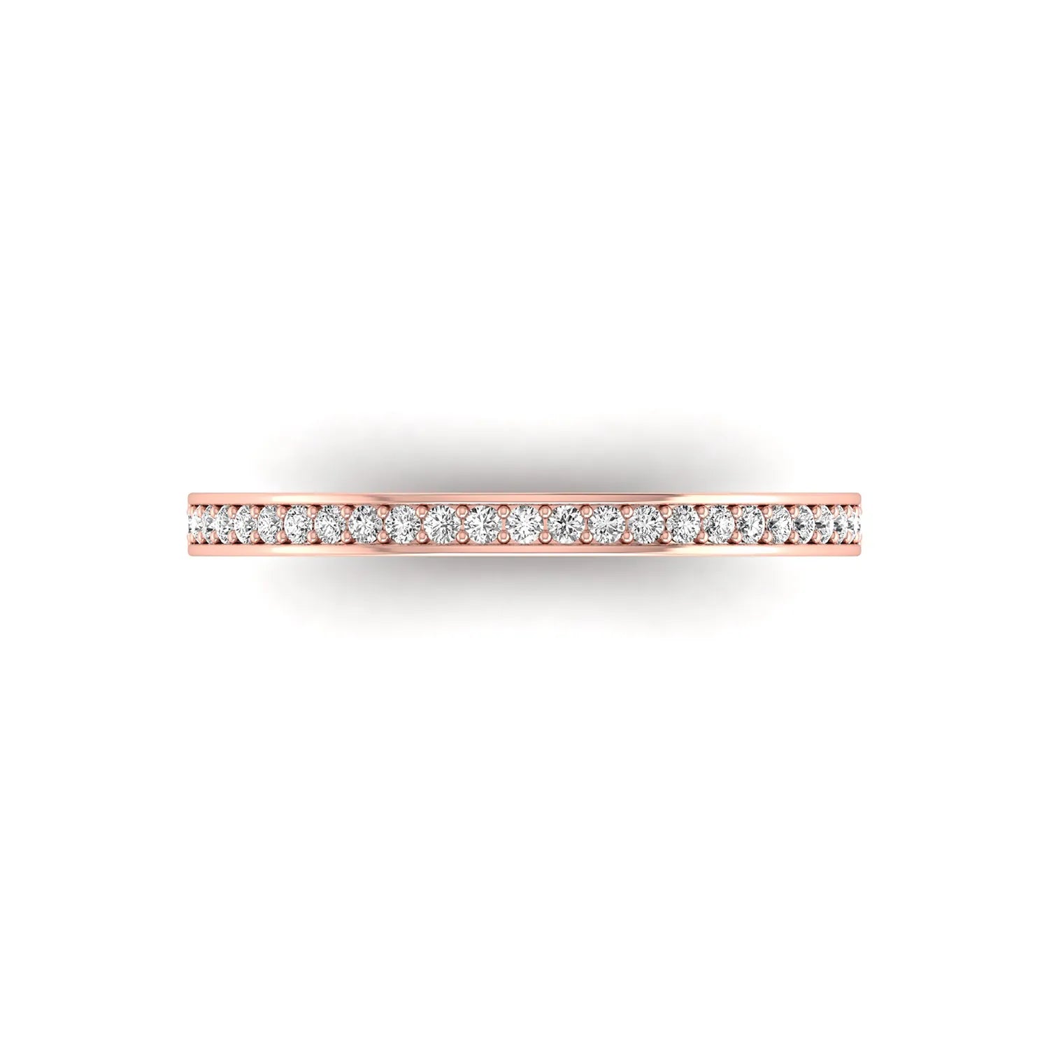Round channel set lab grown diamond half eternity band ring featuring brilliant round diamonds in a slim stackable wedding band design in rose gold