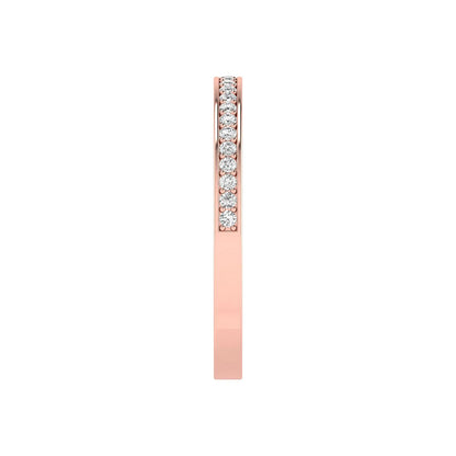 Round channel set lab grown diamond half eternity band ring featuring brilliant round diamonds in a slim stackable wedding band design in rose gold