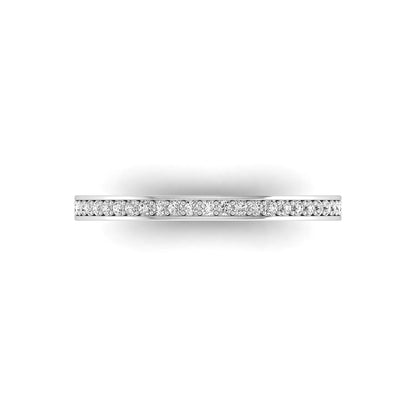 Round channel set lab grown diamond half eternity band ring featuring brilliant round diamonds in a slim stackable wedding band design in white gold