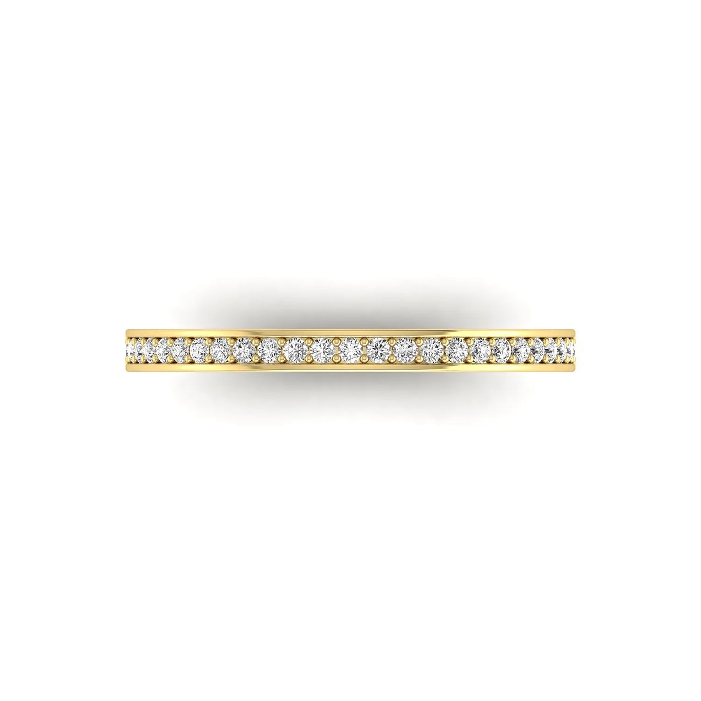 Round channel set lab grown diamond half eternity band ring featuring brilliant round diamonds in a slim stackable wedding band design in yellow gold