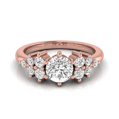 Round cut lab grown diamond engagement ring featuring a brilliant center diamond with floral-inspired round diamond cluster side accents in a classic prong setting in rose gold