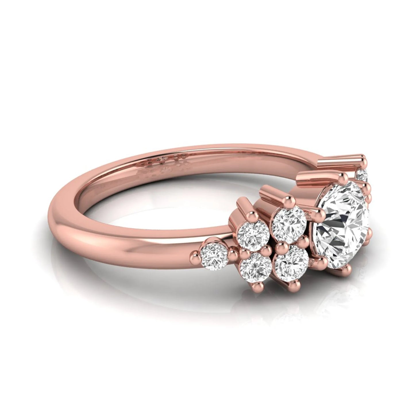 Round cut lab grown diamond engagement ring featuring a brilliant center diamond with floral-inspired round diamond cluster side accents in a classic prong setting in rose gold