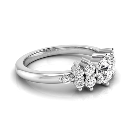 Round cut lab grown diamond engagement ring featuring a brilliant center diamond with floral-inspired round diamond cluster side accents in a classic prong setting in white gold