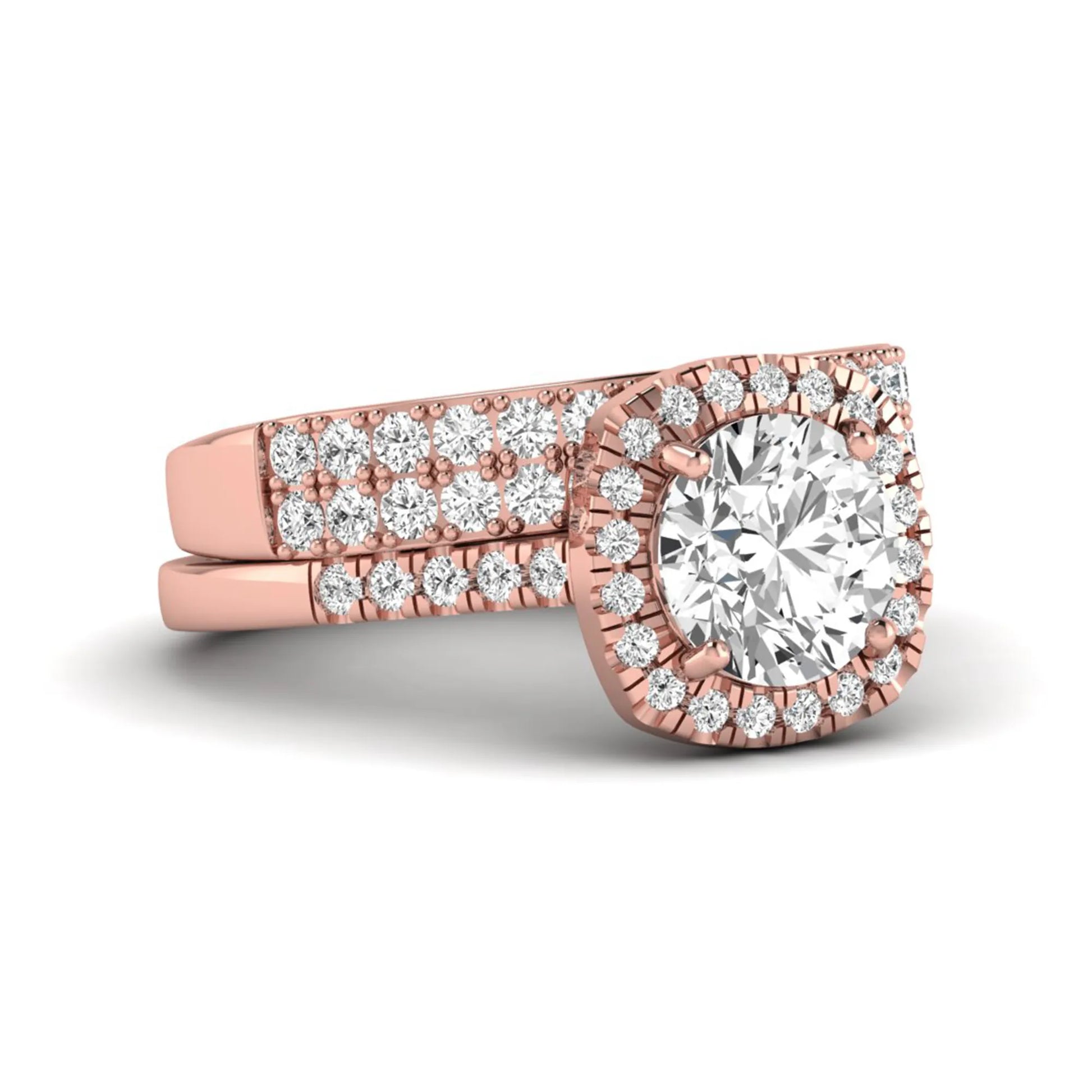 Round Cushion Halo Bridal Ring Set featuring an 8.00 mm round lab grown diamond with a cushion-shaped halo, pavé engagement ring, and matching pavé wedding band in rose gold