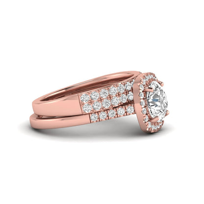 Round Cushion Halo Bridal Ring Set featuring an 8.00 mm round lab grown diamond with a cushion-shaped halo, pavé engagement ring, and matching pavé wedding band in rose gold