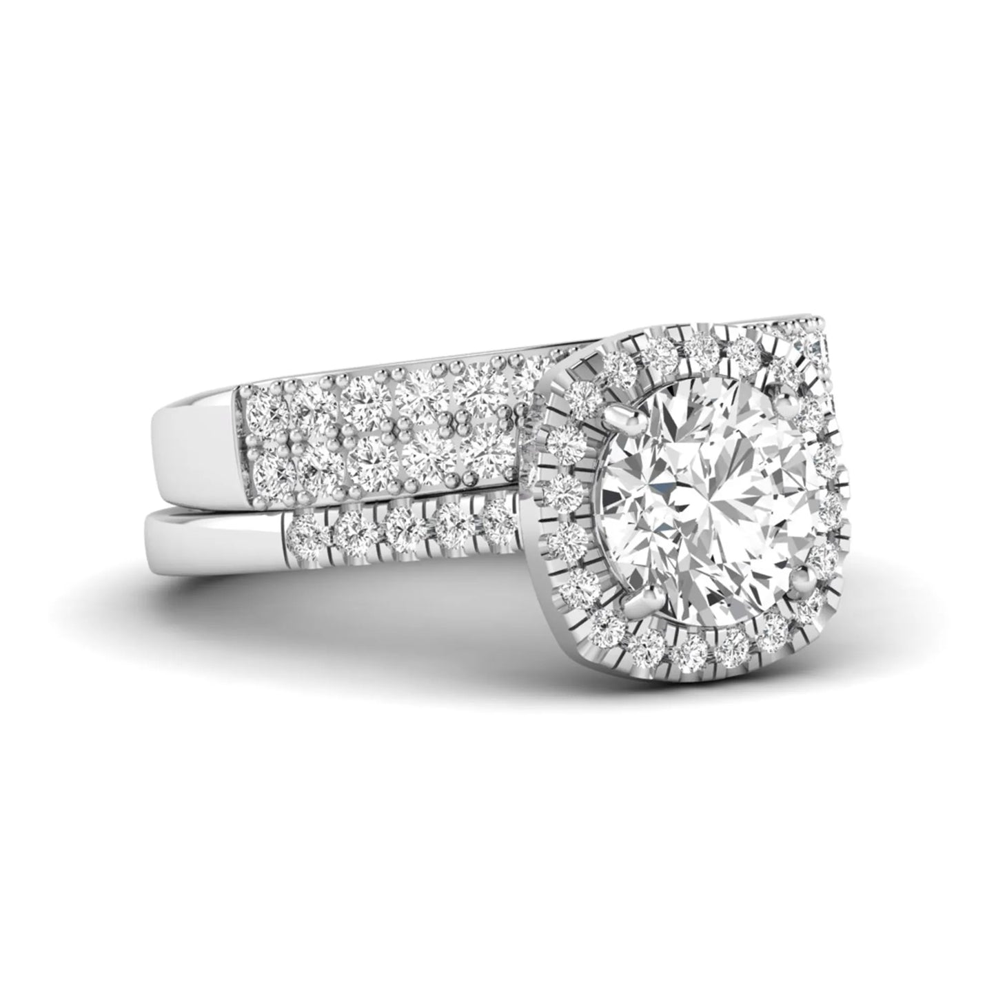 Round Cushion Halo Bridal Ring Set featuring an 8.00 mm round lab grown diamond with a cushion-shaped halo, pavé engagement ring, and matching pavé wedding band in white gold