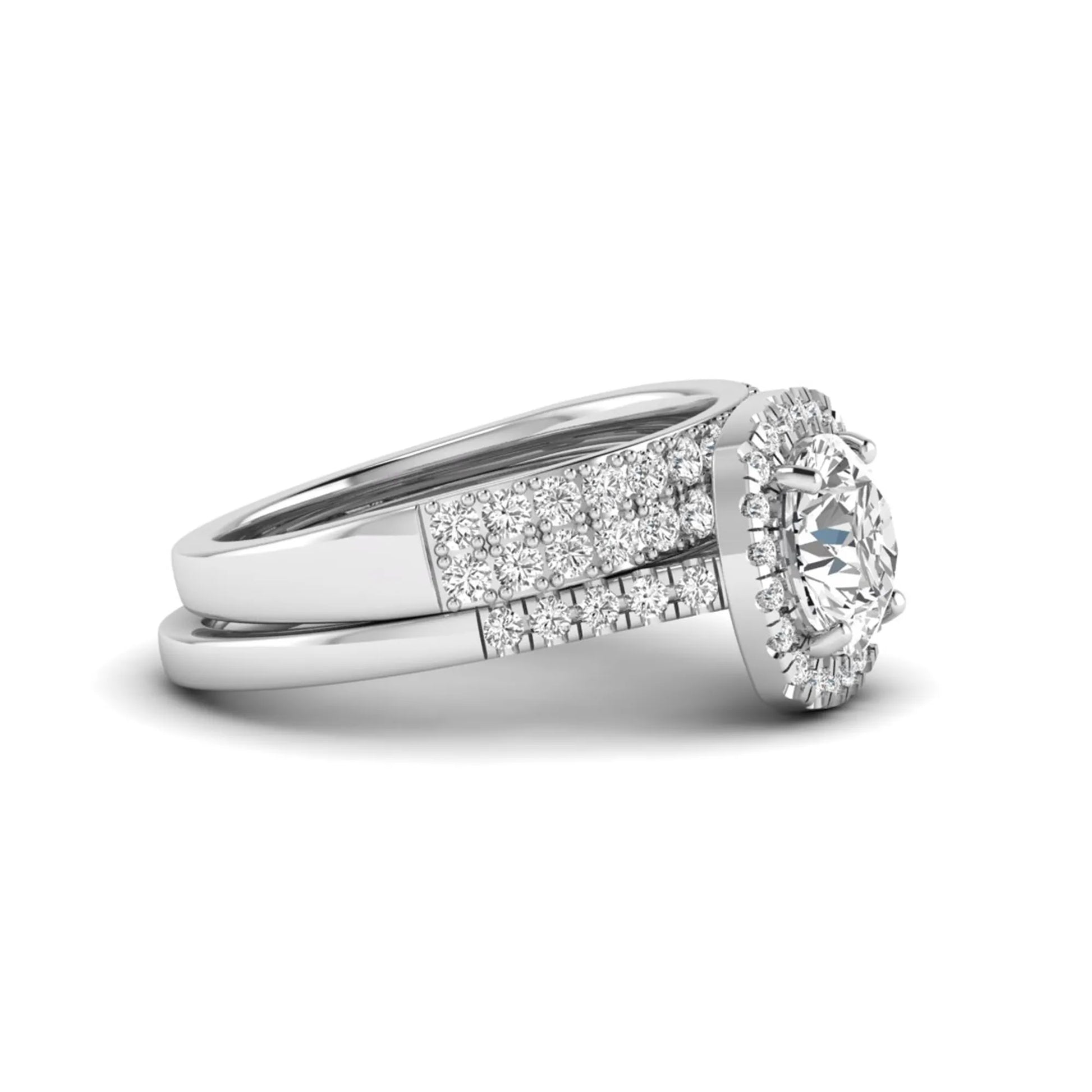 Round Cushion Halo Bridal Ring Set featuring an 8.00 mm round lab grown diamond with a cushion-shaped halo, pavé engagement ring, and matching pavé wedding band in white gold