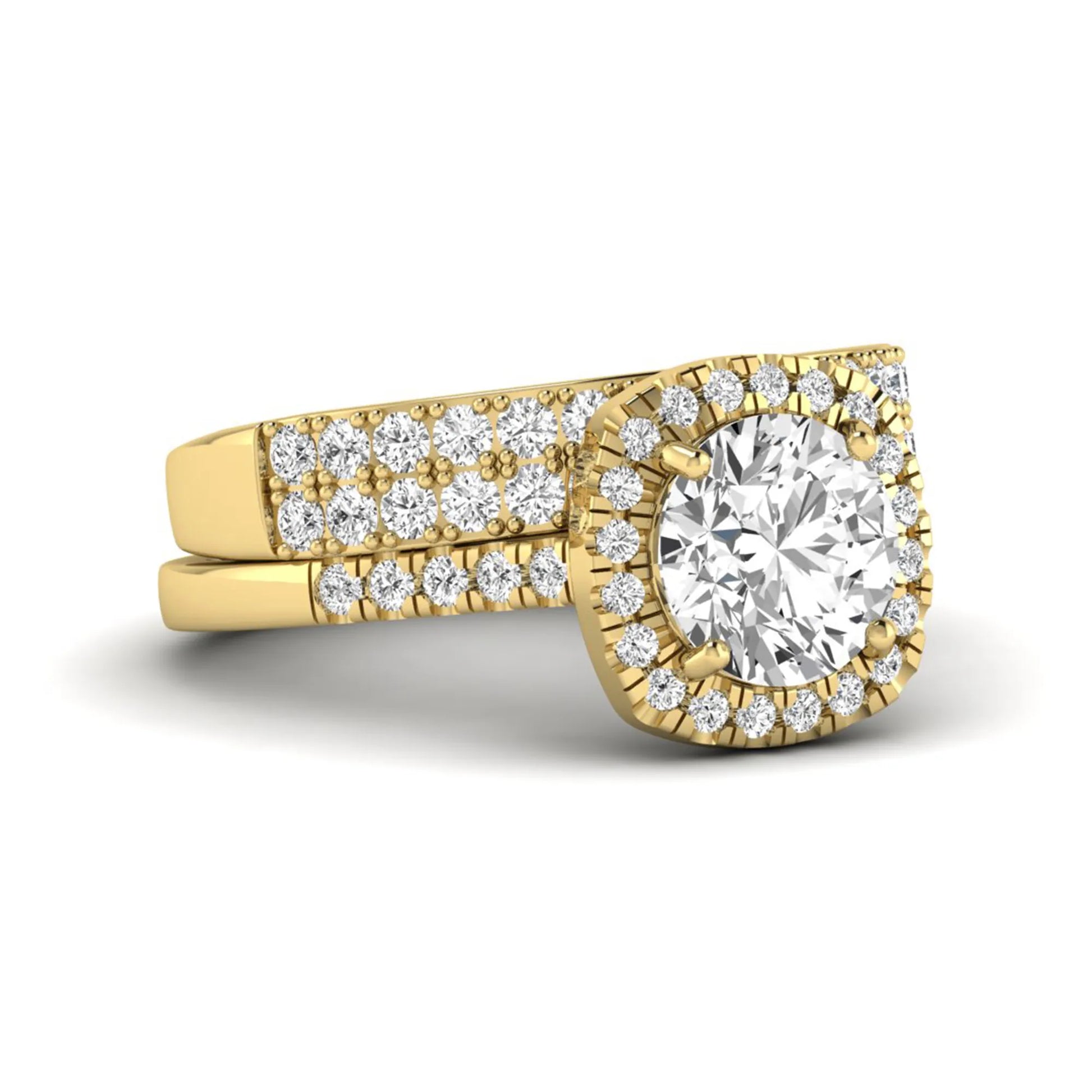 Round Cushion Halo Bridal Ring Set featuring an 8.00 mm round lab grown diamond with a cushion-shaped halo, pavé engagement ring, and matching pavé wedding band in yellow gold