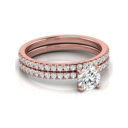 Round cut lab grown diamond bridal ring set featuring a 1.03 carat IGI certified center diamond with matching pavé diamond wedding band in rose gold.