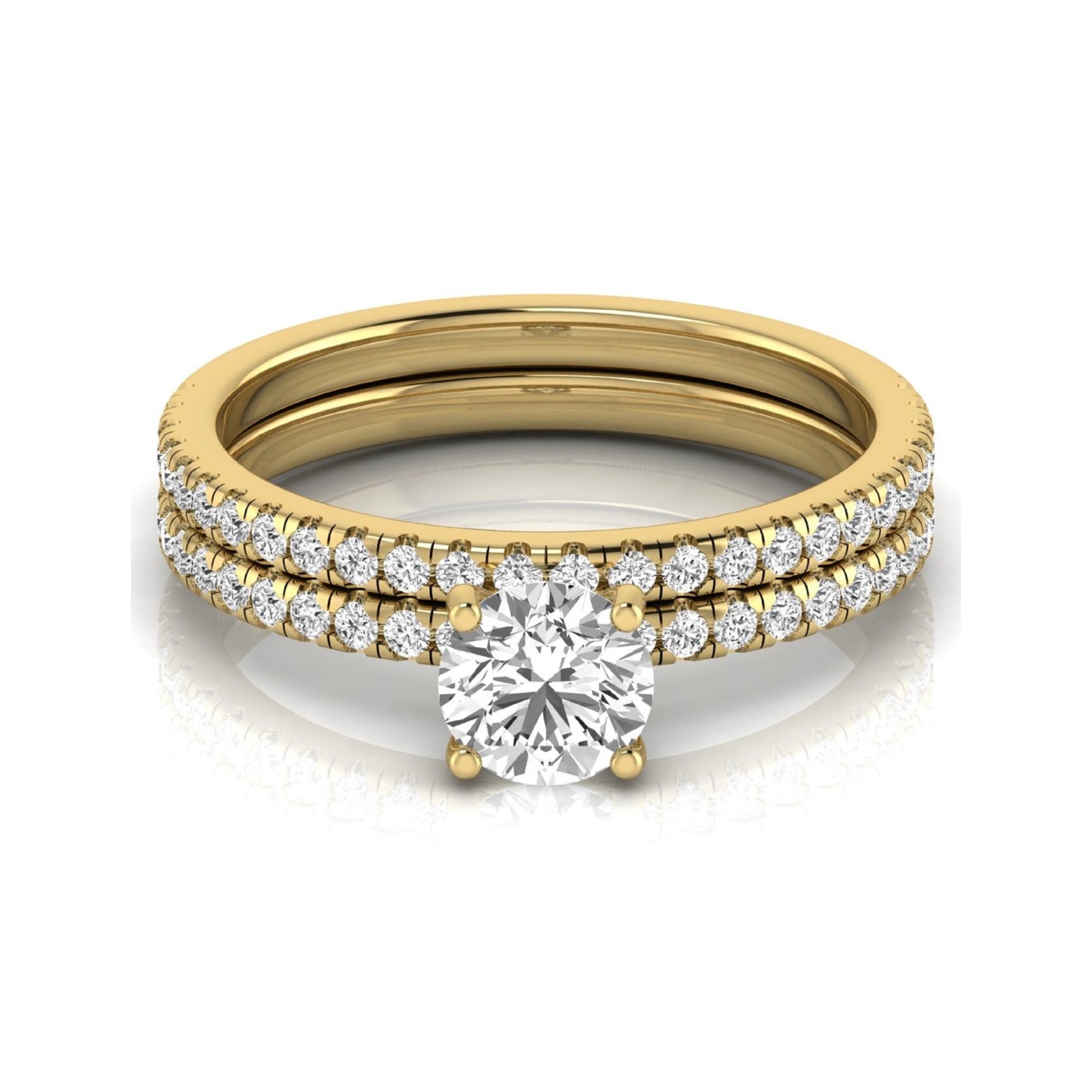Round cut lab grown diamond bridal ring set featuring a 1.03 carat IGI certified center diamond with matching pavé diamond wedding band in yellow gold.
