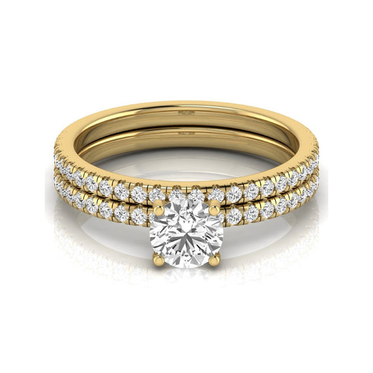 Round cut lab grown diamond bridal ring set featuring a 1.03 carat IGI certified center diamond with matching pavé diamond wedding band in yellow gold.
