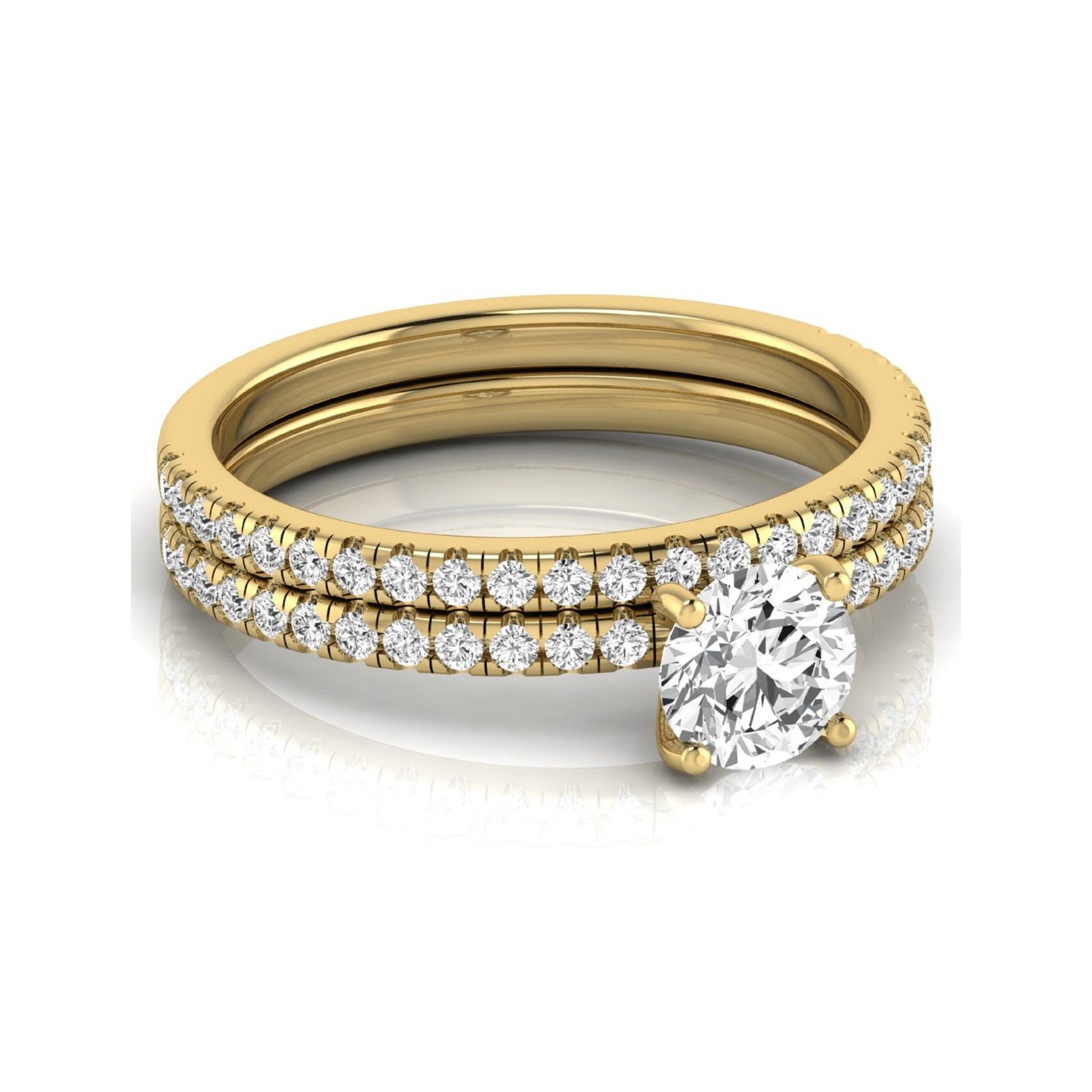 Round cut lab grown diamond bridal ring set featuring a 1.03 carat IGI certified center diamond with matching pavé diamond wedding band in yellow gold.
