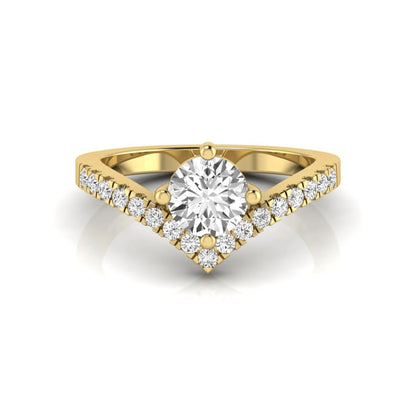 Round cut lab grown diamond engagement ring featuring a four-prong setting with a chevron pavé diamond band in yellow gold tone.