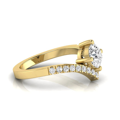 Round cut lab grown diamond engagement ring featuring a four-prong setting with a chevron pavé diamond band in yellow gold tone.