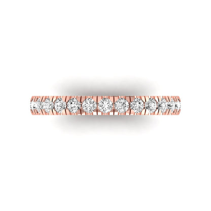 Round cut lab grown diamond full eternity band in rose gold featuring shared prong set diamonds around the entire band.