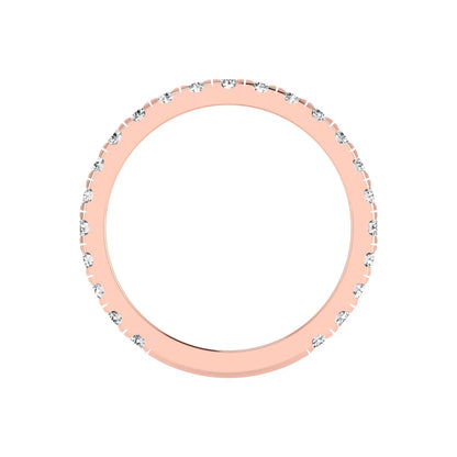 Round cut lab grown diamond full eternity band in rose gold featuring shared prong set diamonds around the entire band.