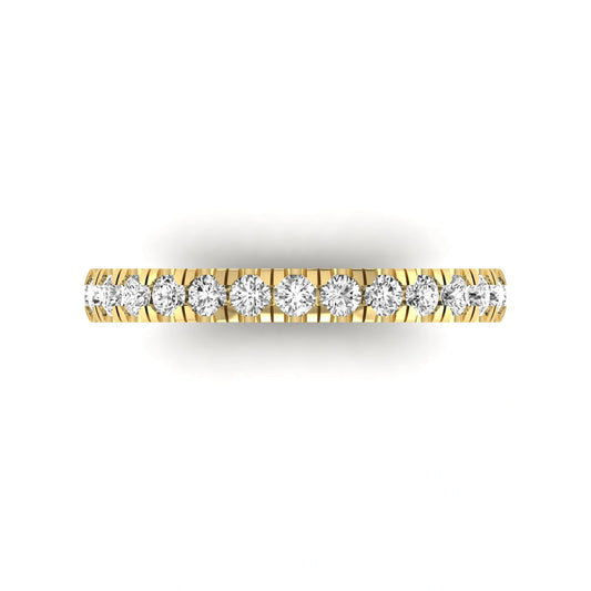 Round cut lab grown diamond full eternity band in yellow gold featuring shared prong set diamonds around the entire band.