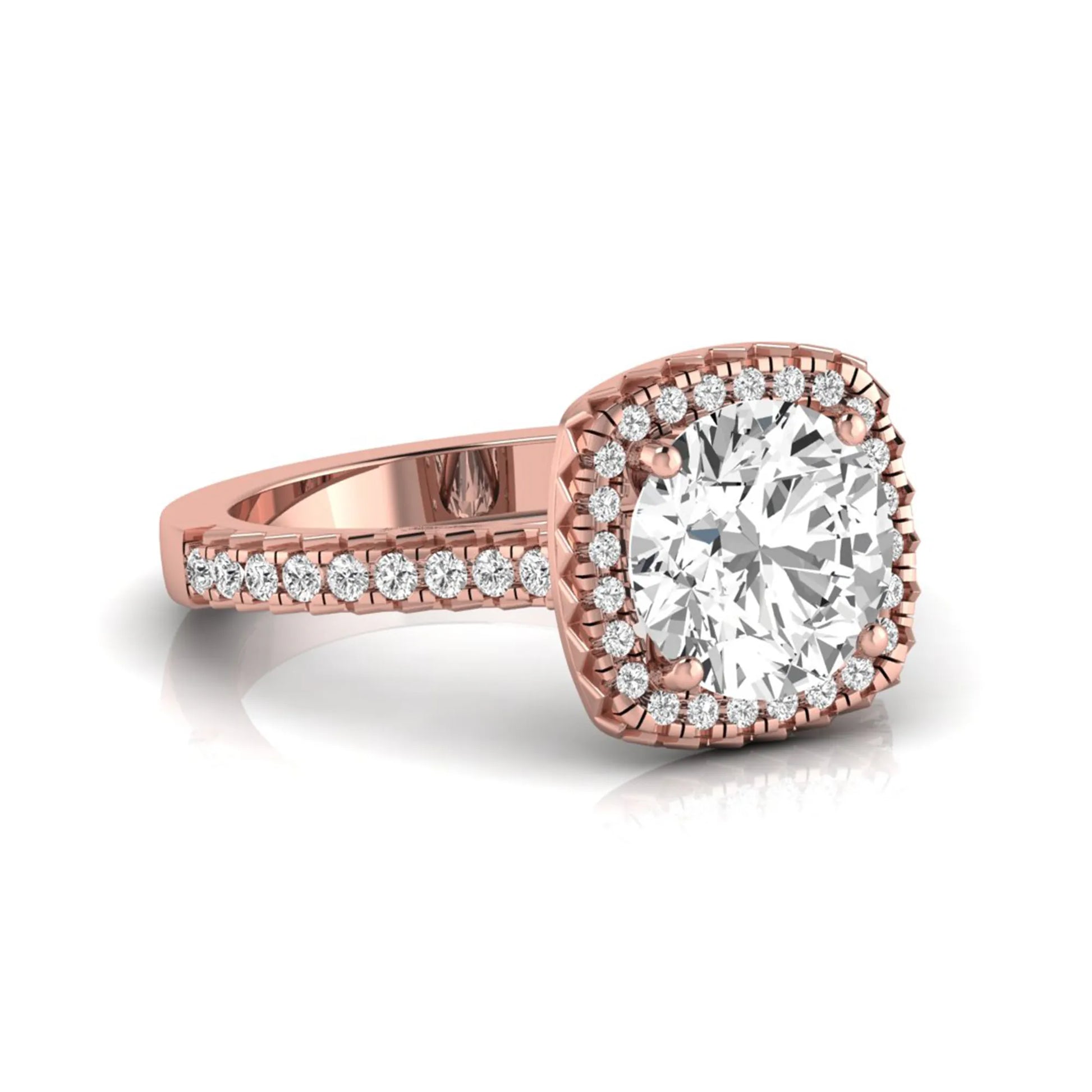 Round cut lab grown diamond halo engagement ring featuring a four-prong center setting with a pavé diamond band in rose gold tone.
