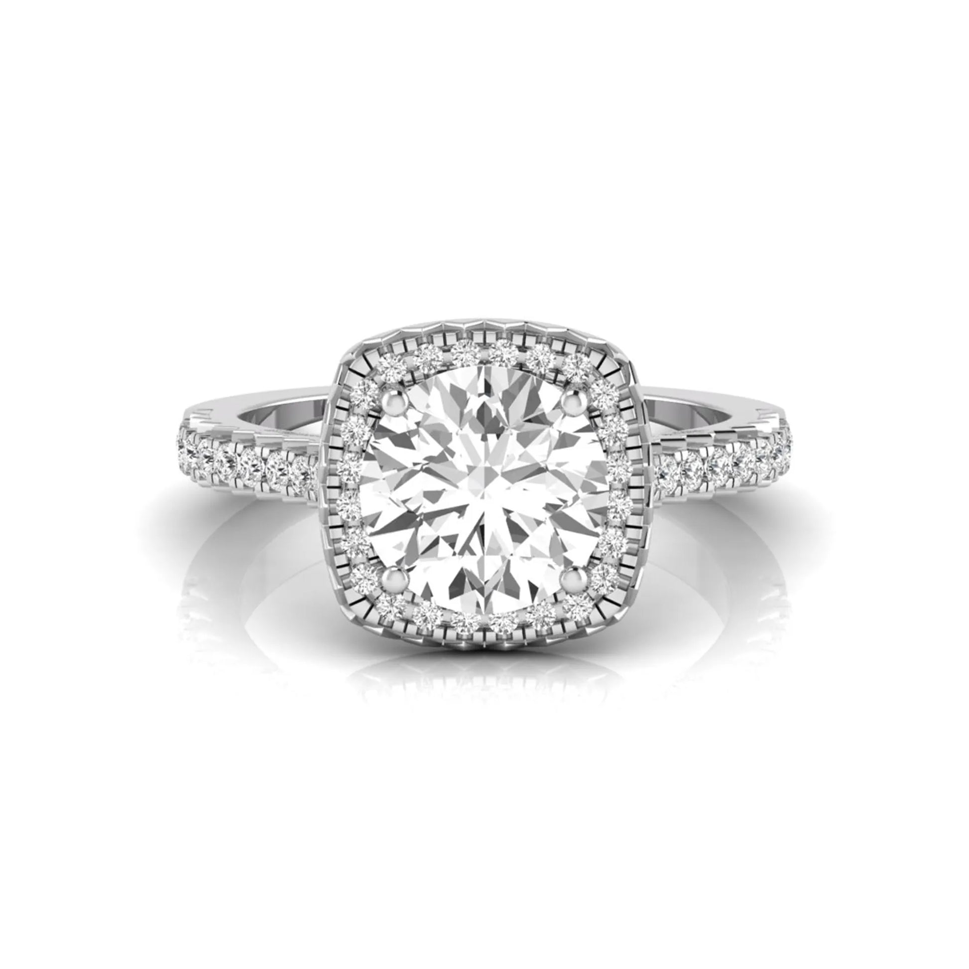 Round cut lab grown diamond halo engagement ring featuring a four-prong center setting with a pavé diamond band in white gold tone.