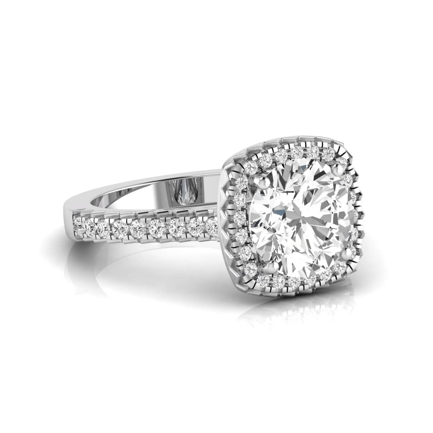 Round cut lab grown diamond halo engagement ring featuring a four-prong center setting with a pavé diamond band in white gold tone.