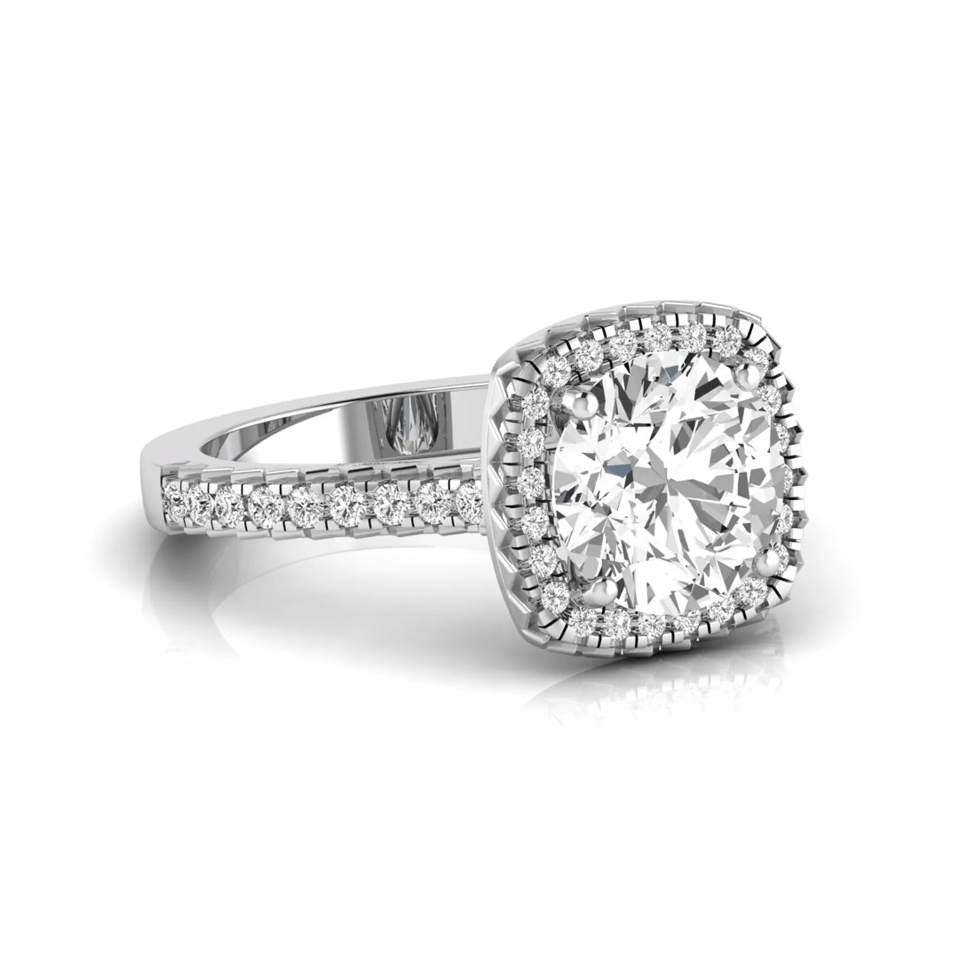Round cut lab grown diamond halo engagement ring featuring a four-prong center setting with a pavé diamond band in white gold tone.