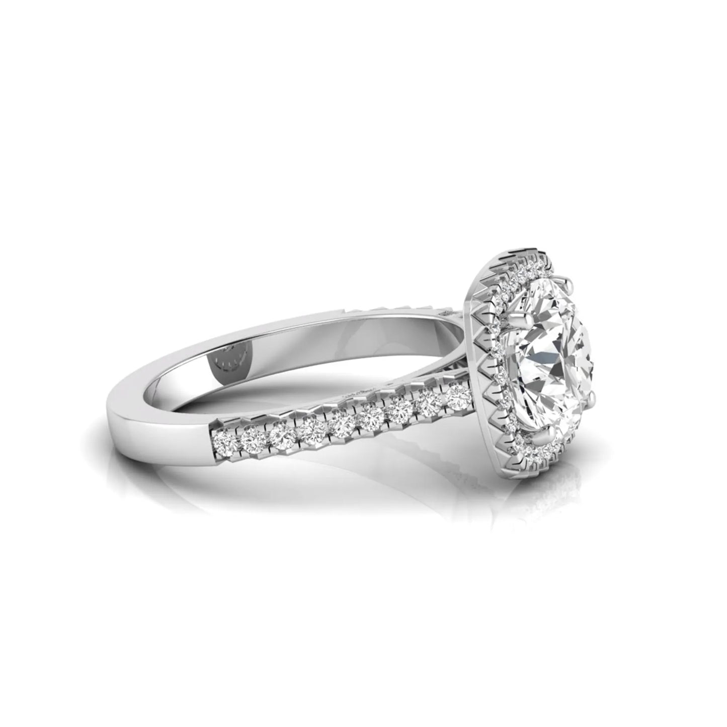 Round cut lab grown diamond halo engagement ring featuring a four-prong center setting with a pavé diamond band in white gold tone.