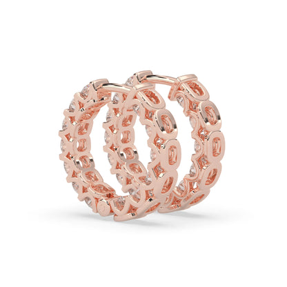 rose gold Round cut lab grown diamond hoop earrings featuring 2.50 mm diamonds in a shared prong setting with hinged closure.