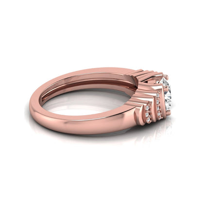 Round cut lab grown diamond engagement ring featuring a 0.84 carat center diamond with round side stone accents in rose gold.