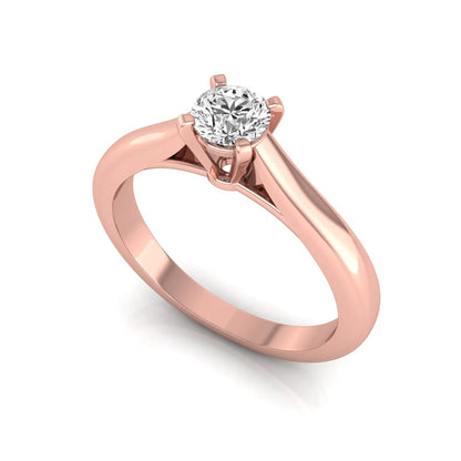 Round cut lab grown diamond solitaire engagement ring featuring a 0.33 carat center diamond in a classic four-prong setting in rose gold