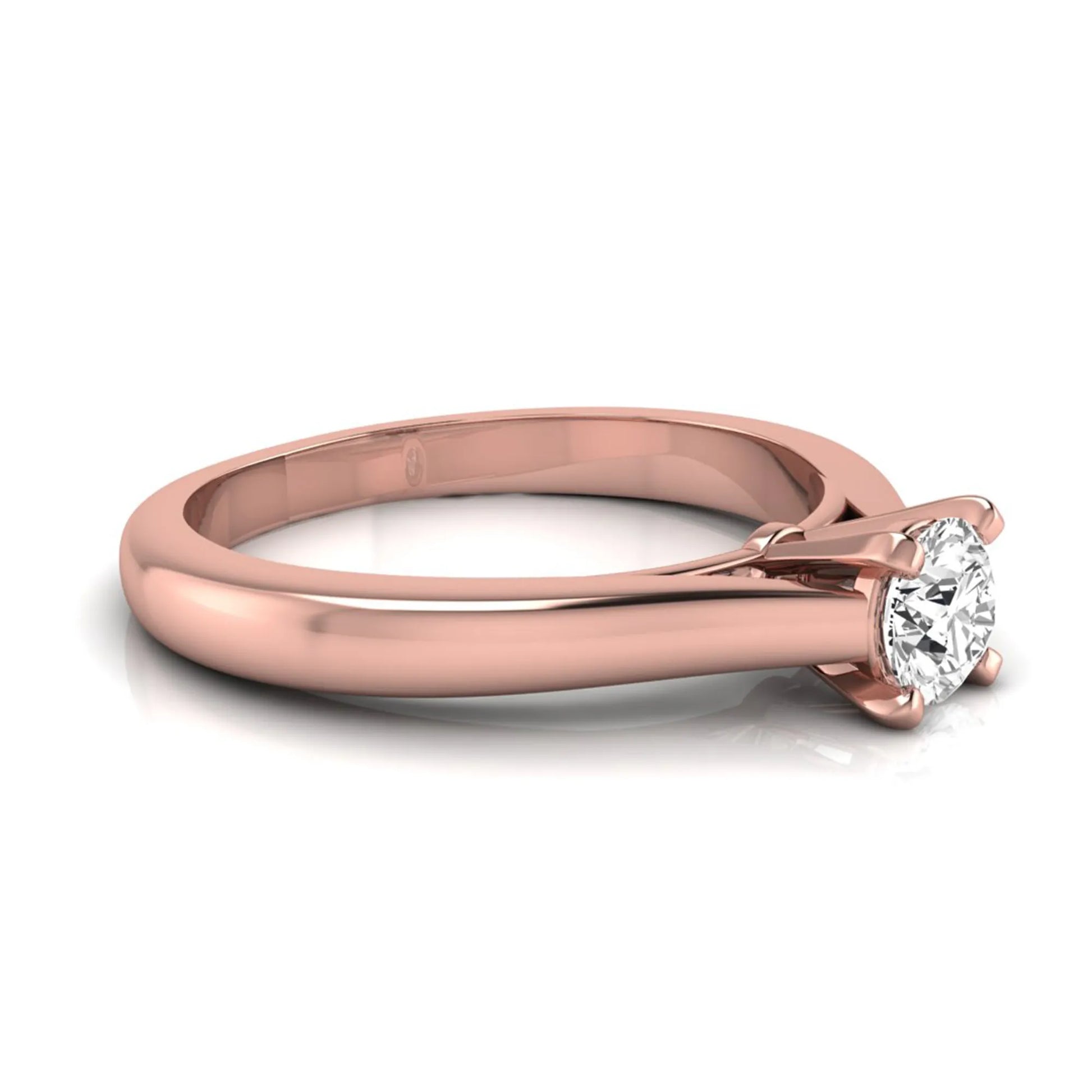 Round cut lab grown diamond solitaire engagement ring featuring a 0.33 carat center diamond in a classic four-prong setting in rose gold