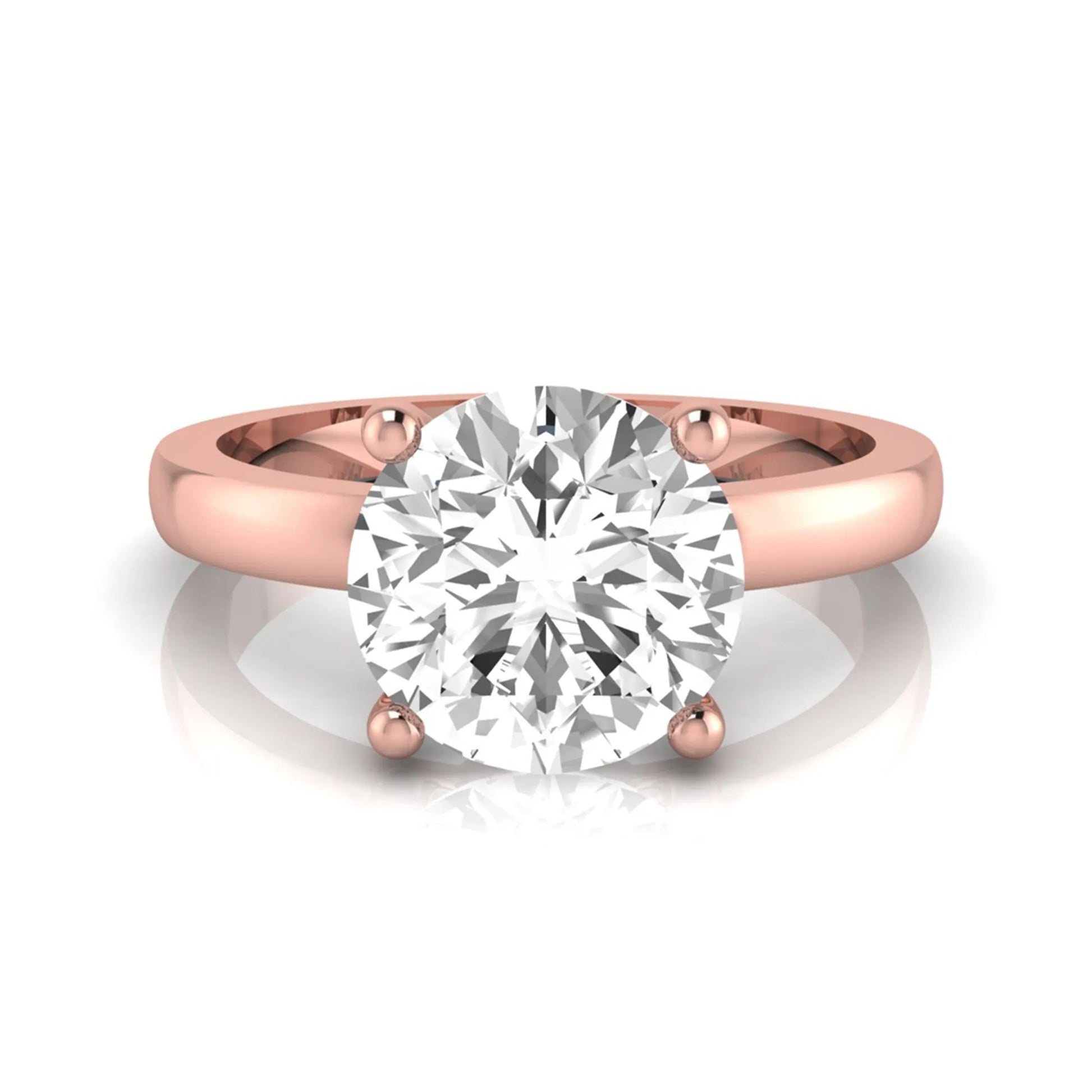 Round cut IGI certified 2.04 carat lab grown diamond solitaire engagement ring in rose gold with a classic four-prong setting.