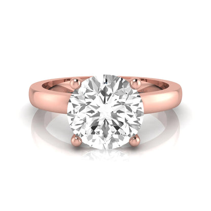 Round cut IGI certified 2.04 carat lab grown diamond solitaire engagement ring in rose gold with a classic four-prong setting.