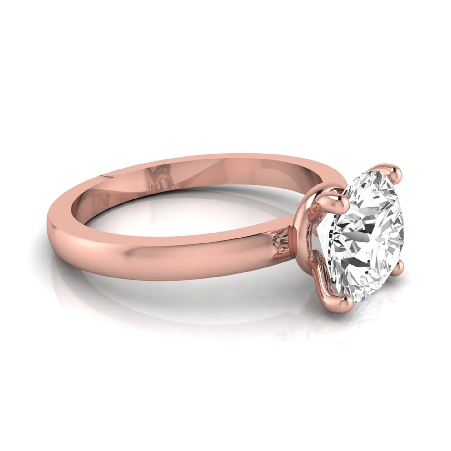 Round cut IGI certified 2.04 carat lab grown diamond solitaire engagement ring in rose gold with a classic four-prong setting.