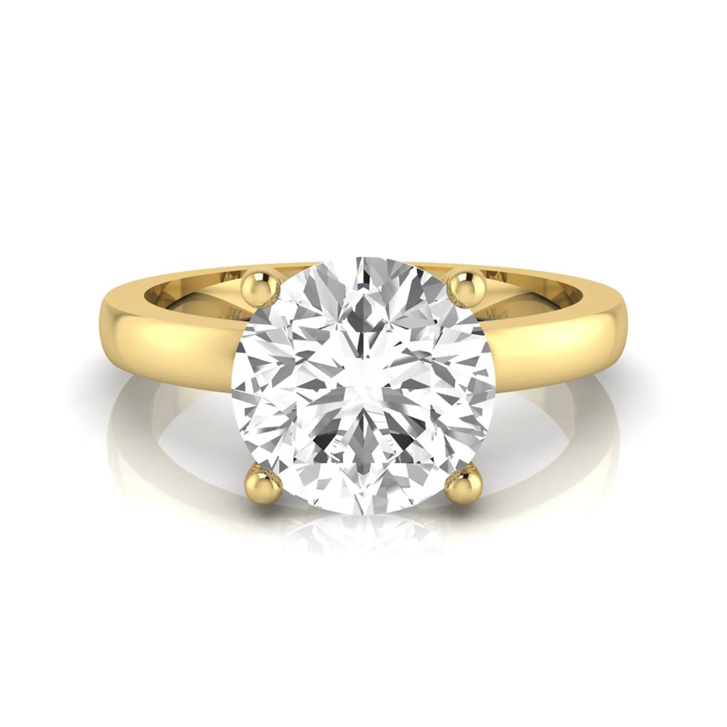 Round cut IGI certified 2.04 carat lab grown diamond solitaire engagement ring in yellow gold with a classic four-prong setting.