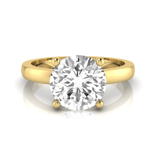 Round cut IGI certified 2.04 carat lab grown diamond solitaire engagement ring in yellow gold with a classic four-prong setting.