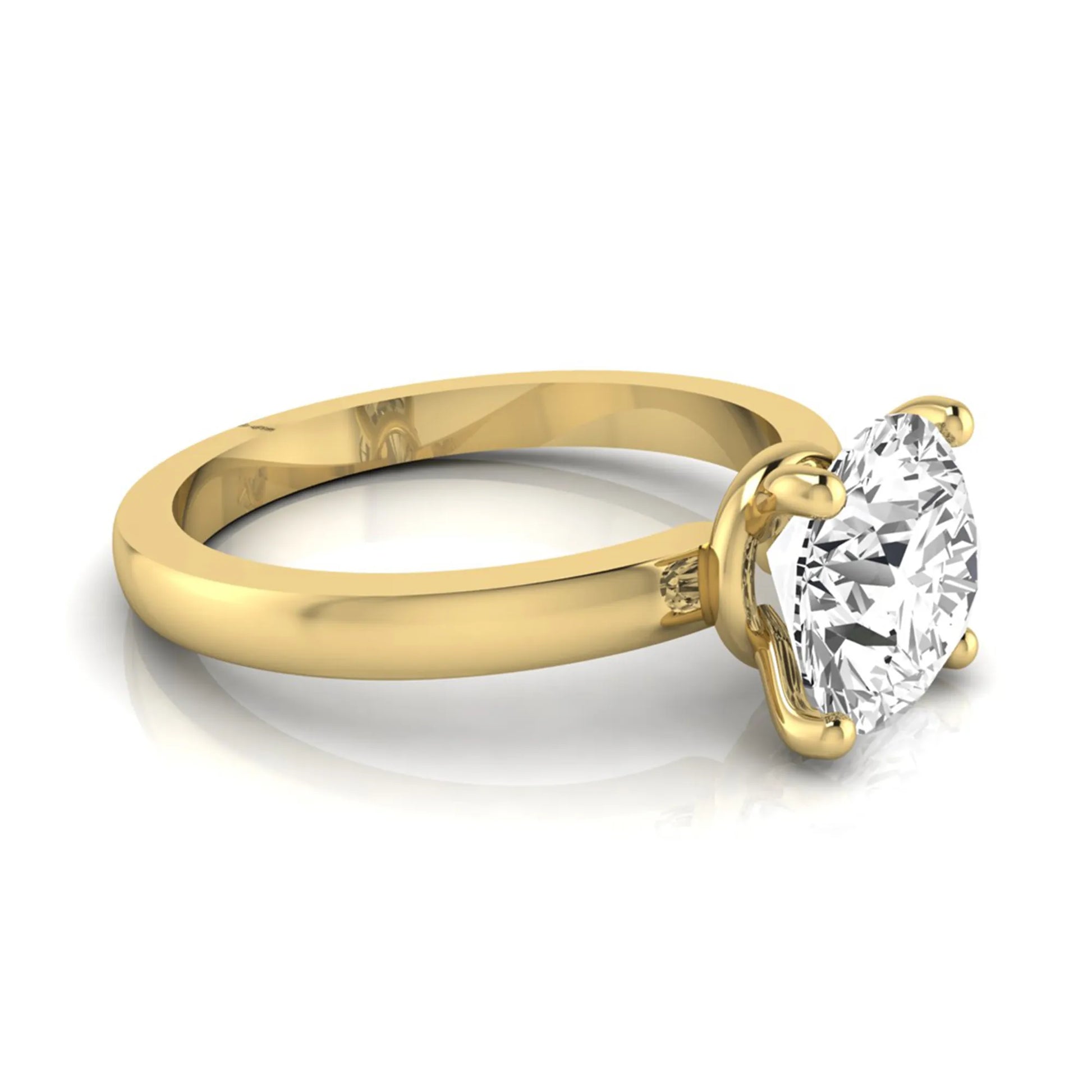 Round cut IGI certified 2.04 carat lab grown diamond solitaire engagement ring in yellow gold with a classic four-prong setting.