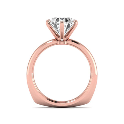 IGI certified round cut lab grown diamond solitaire engagement ring in rose gold with a classic six-prong setting.