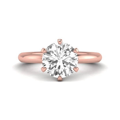 IGI certified round cut lab grown diamond solitaire engagement ring in rose gold with a classic six-prong setting.