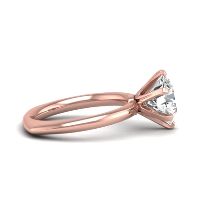 IGI certified round cut lab grown diamond solitaire engagement ring in rose gold with a classic six-prong setting.