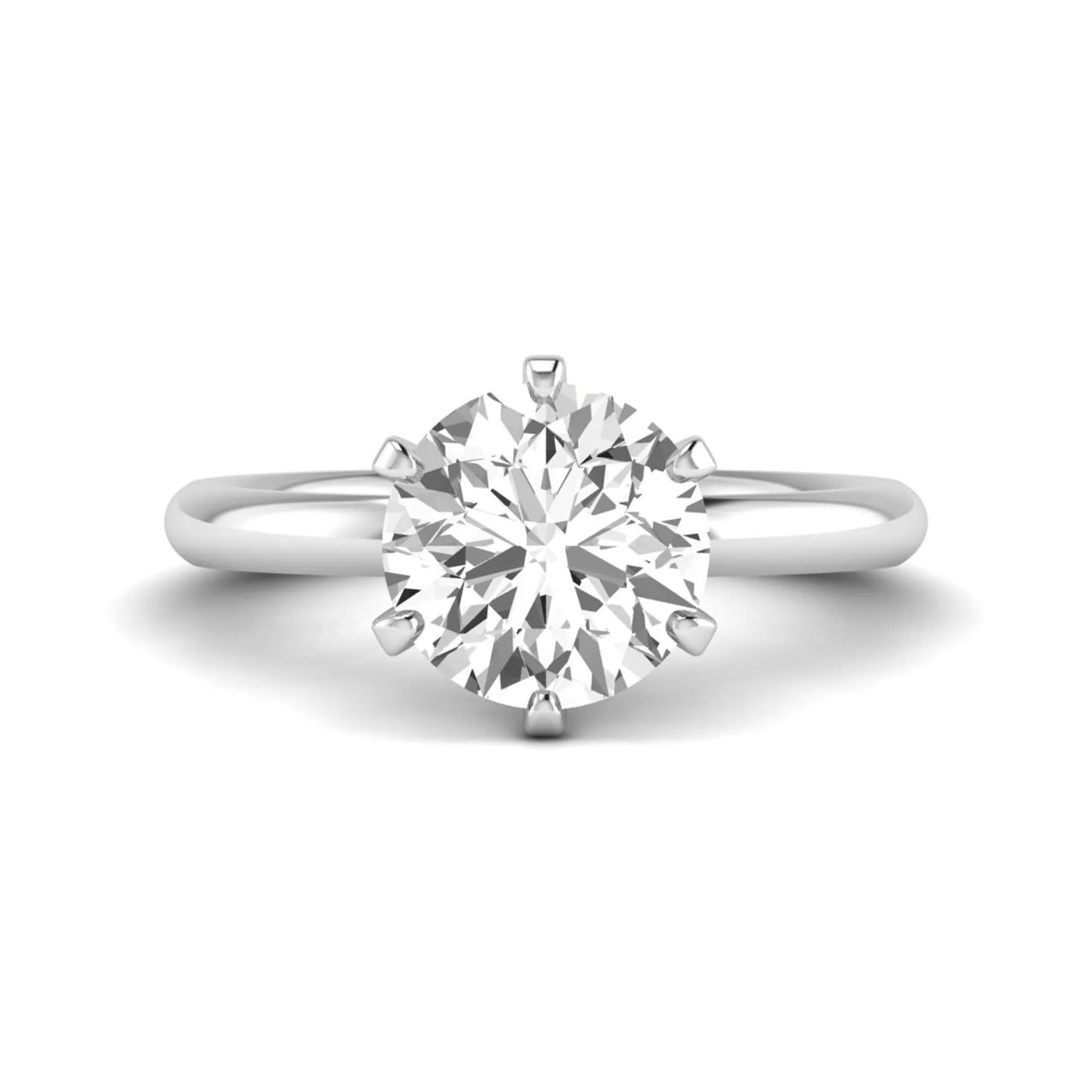 IGI certified round cut lab grown diamond solitaire engagement ring in white gold with a classic six-prong setting.