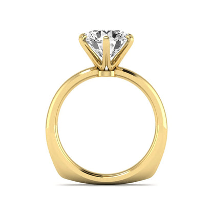 IGI certified round cut lab grown diamond solitaire engagement ring in yellow gold with a classic six-prong setting.