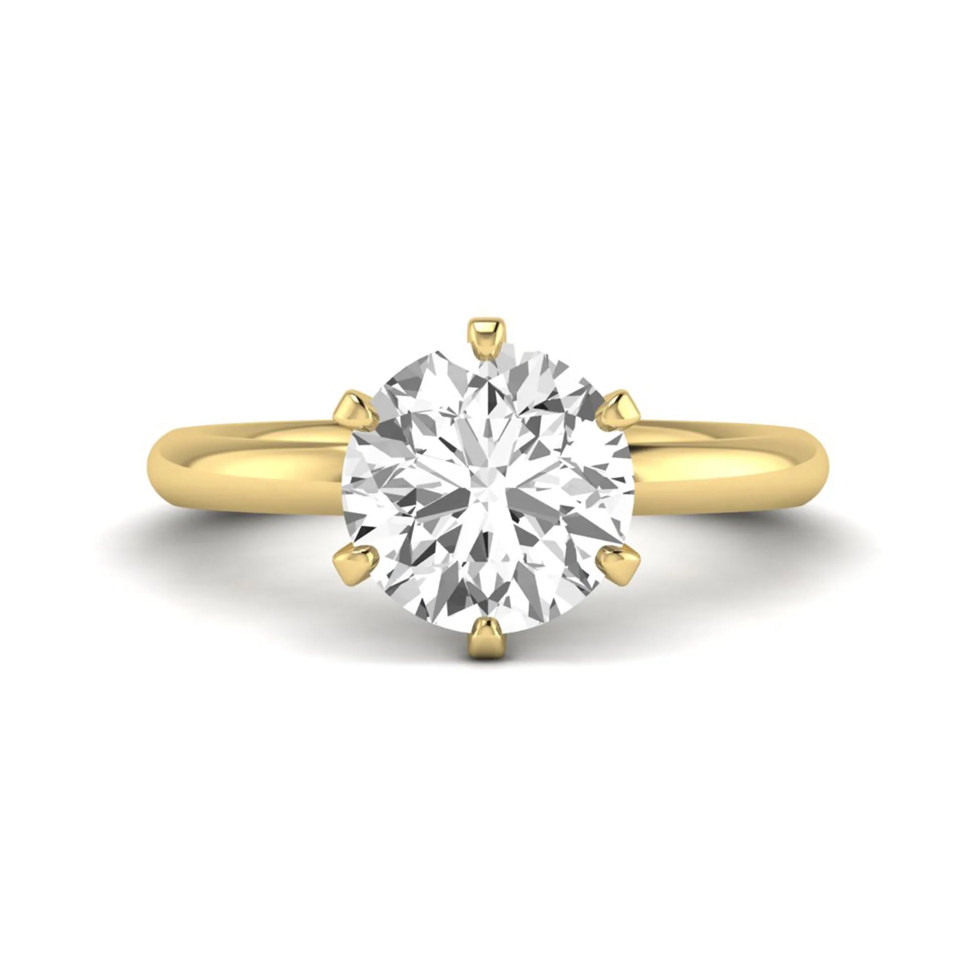 IGI certified round cut lab grown diamond solitaire engagement ring in yellow gold with a classic six-prong setting.